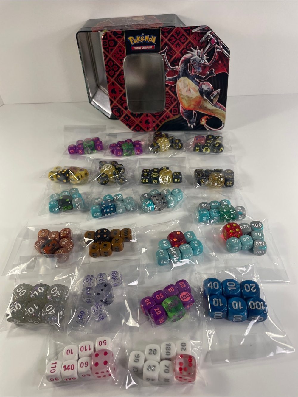 Pokemon Multi-Color Numbered Dice Set with Red and Black Collectible Tin